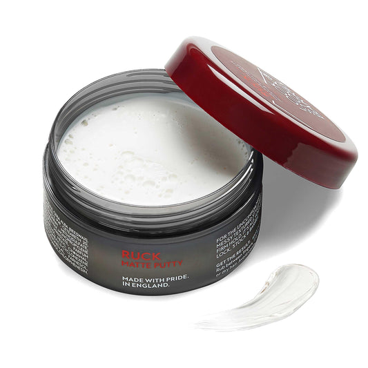 Ruck Matte Putty 3.53 Oz open container showing texture with lid partially closed