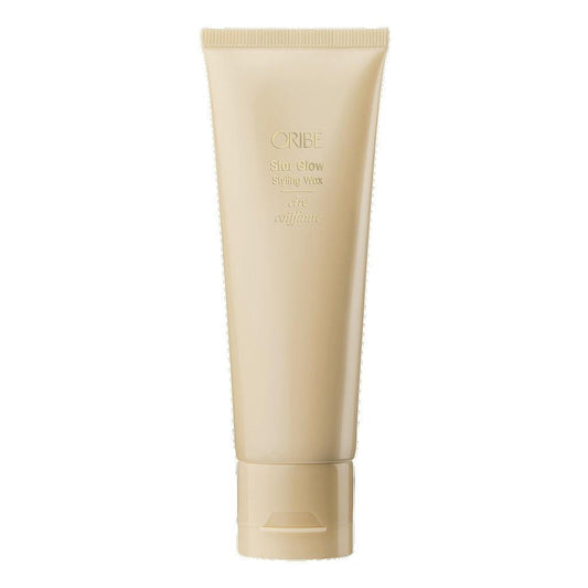 Oribe Star Glow Styling Wax tube offering flexible hold and luminous shine for all hair types